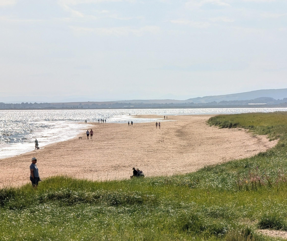Dornoch Beach with a sandy shoreline beside the Dornoch Firth